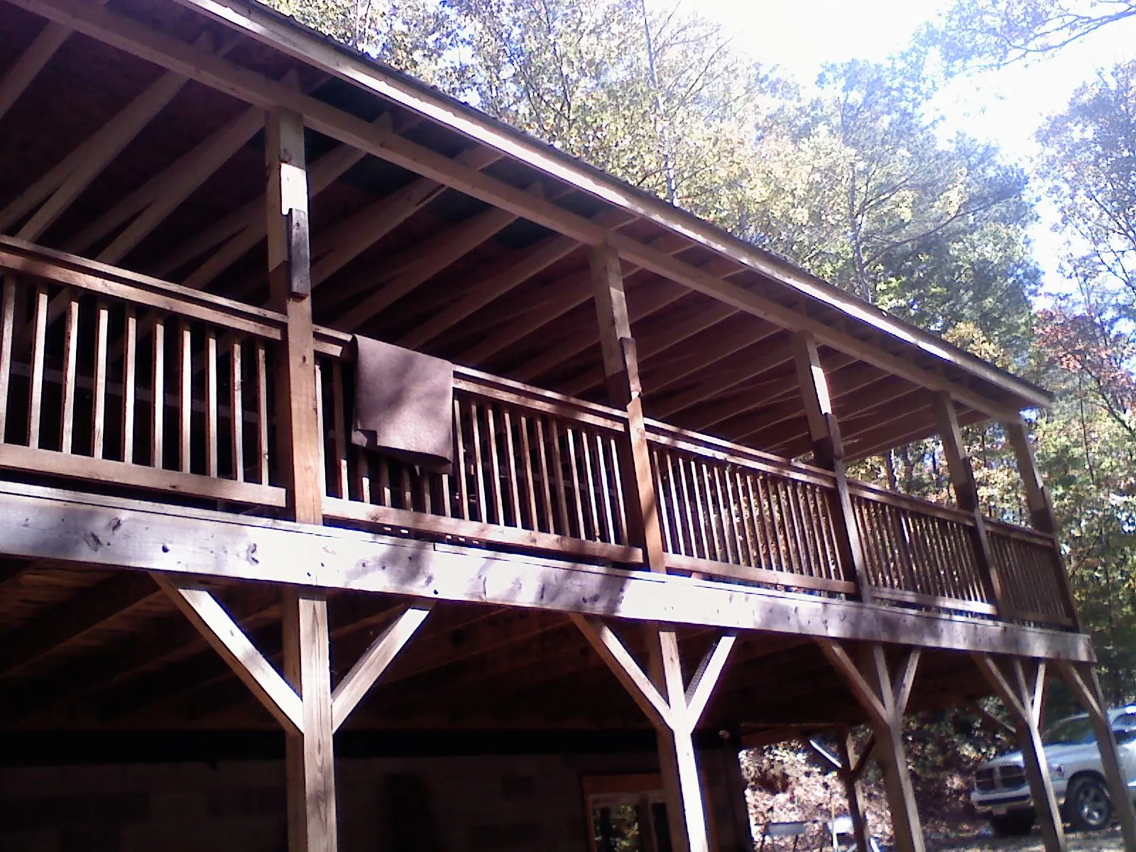 Timber framing under a new elevated porch and deck — Roof Leak Repair in Goldens Bridge by Roofing Brothers